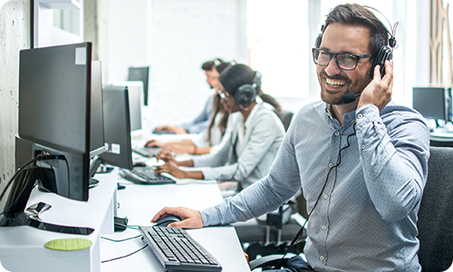 Image representing a happy man working in a call center